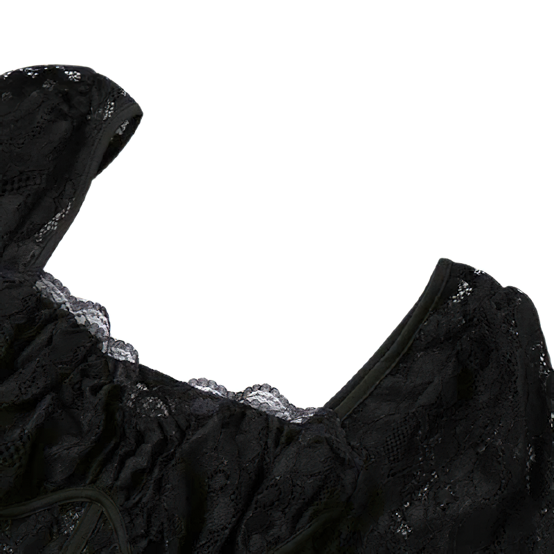 Close-up of women's gothic black lace dress showcasing intricate details and elegant neckline.