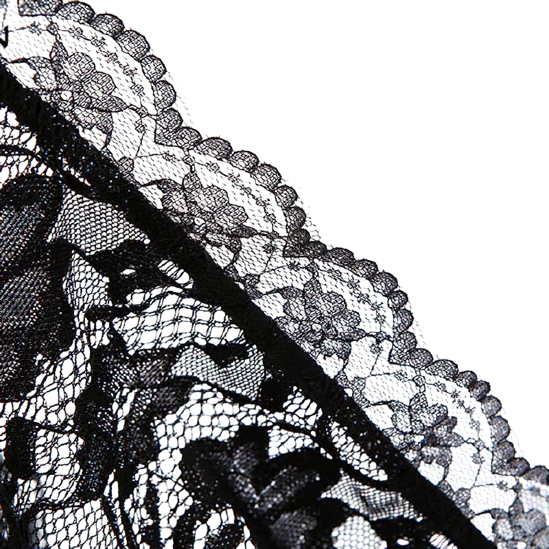 Close-up of elegant black lace detailing for a women's gothic dress, showcasing intricate floral patterns.