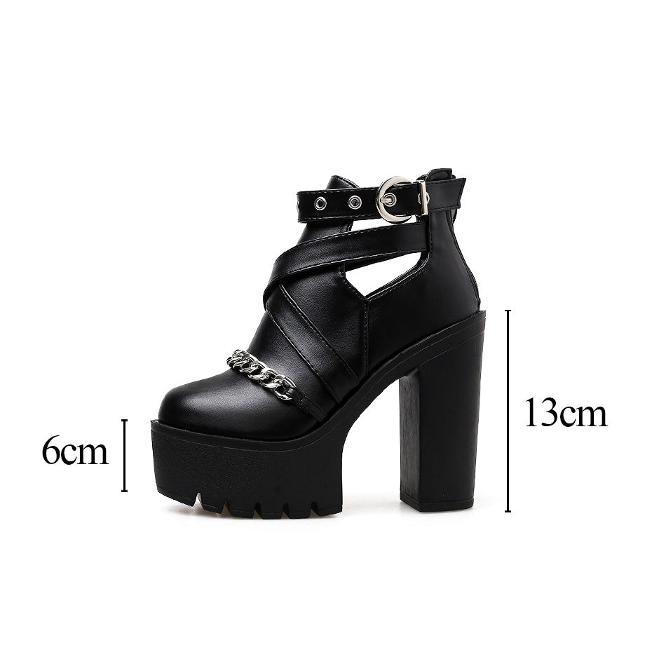 Black platform ankle boots with chain detail and thick heel, perfect for gothic outfits and stylish flair.