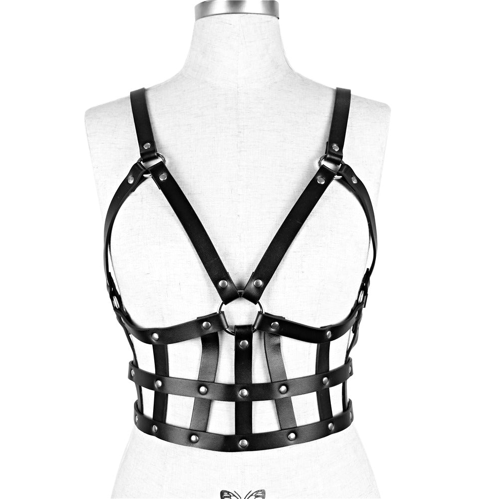Womens black PU leather body chest harness with adjustable straps for a punk and edgy style.