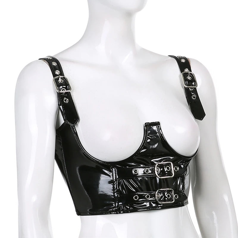 Women's gothic PU leather crop top with shiny buckles and stylish straps, perfect for a bold, grunge look.