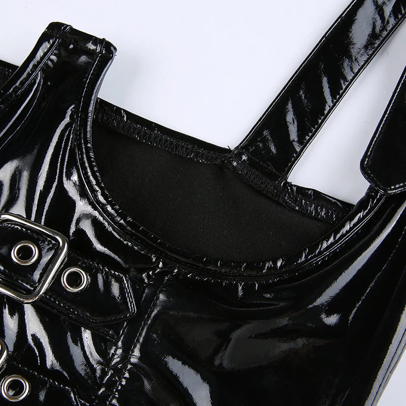 Close-up of a women's black PU leather gothic tank top showcasing shiny buckles and sleek straps.