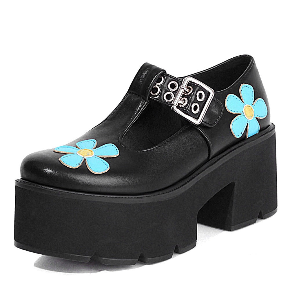 Women's black platform pumps with blue flower design and chunky heel, perfect for punk style outfits.