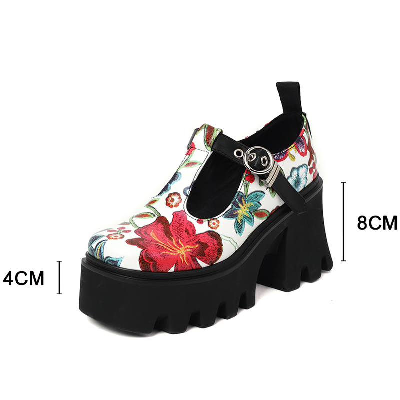 Trendy women's PU leather pumps with vibrant floral print and chunky platform heel, perfect for stylish outfits.