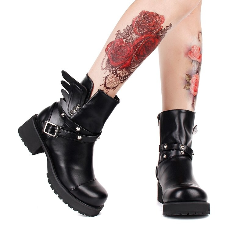 Stylish women's rivet boots with buckle strap and wings, made of PU leather, featuring square heels and a punk vibe.