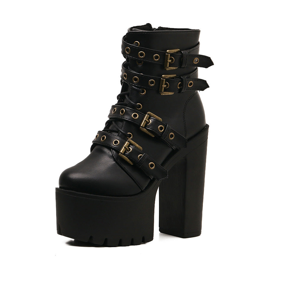 Women's black gothic rivet boots with thick platform heel, buckles, and zipper for stylish winter looks.