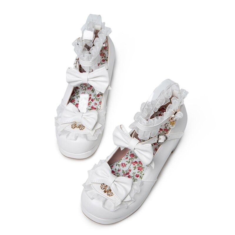 Women's round toe sandals with bow buckle, perfect for cosplay and events. Adorned with ruffles and flowers for a cute look.