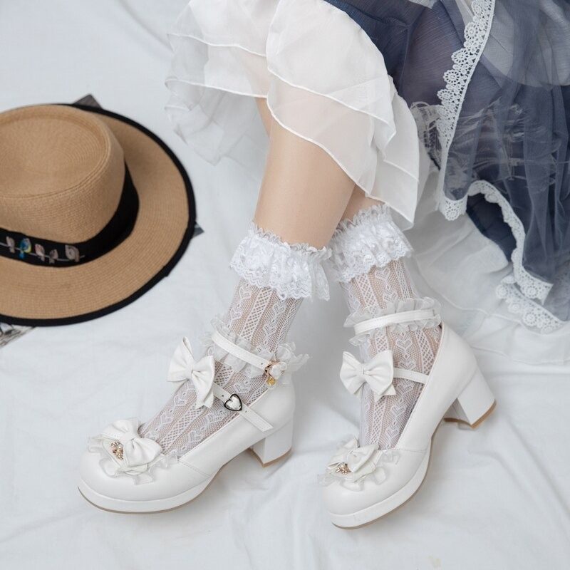 Stylish white round toe sandals with bows, paired with lace socks, perfect for cute cosplay outfits or a charming Mary Jane look.