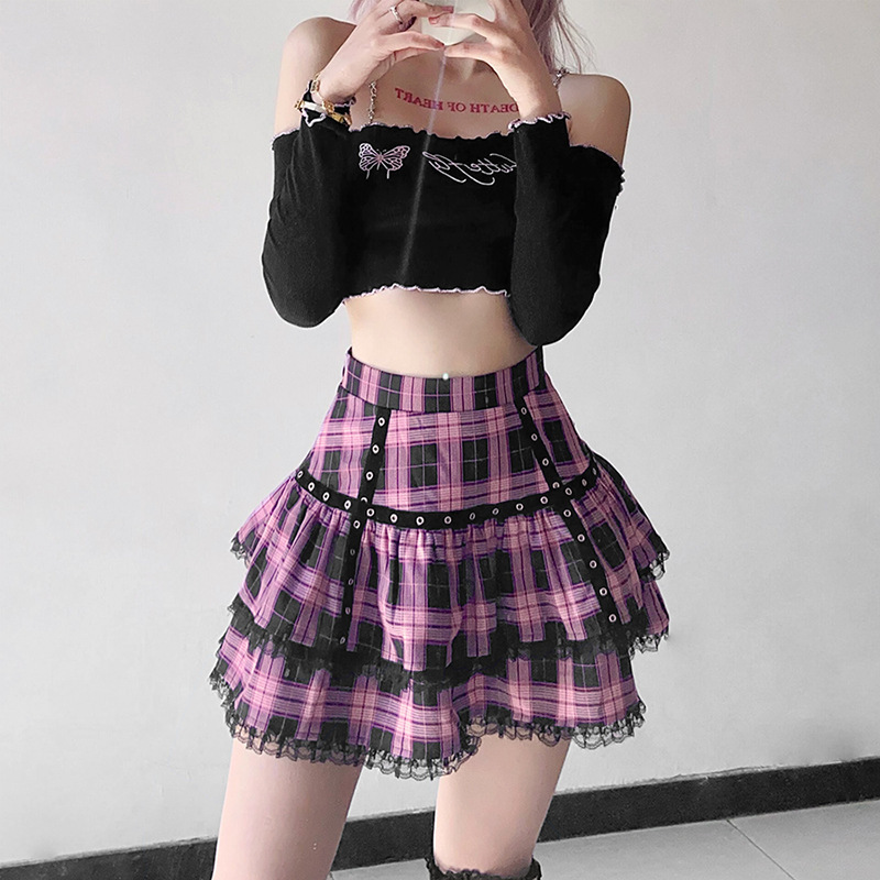 Women's gothic plaid mini skirt in pink with frills, perfect for alternative fashion outfits.