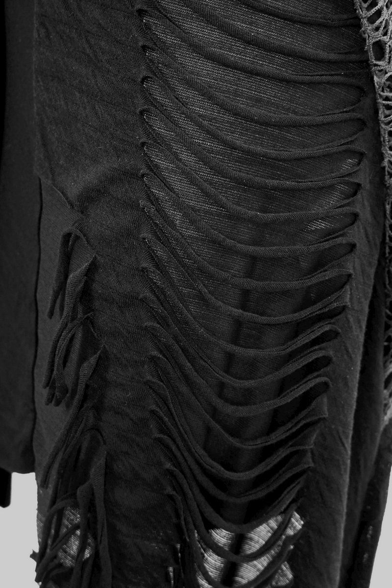 Close-up of black asymmetric dress featuring stylish ripped fabric for a gothic look.