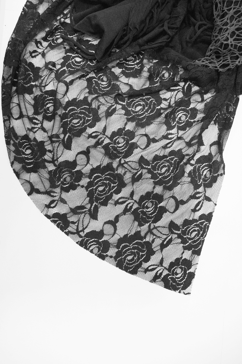 Close-up of black lace fabric featuring intricate rose patterns, perfect for gothic fashion pieces or dresses.