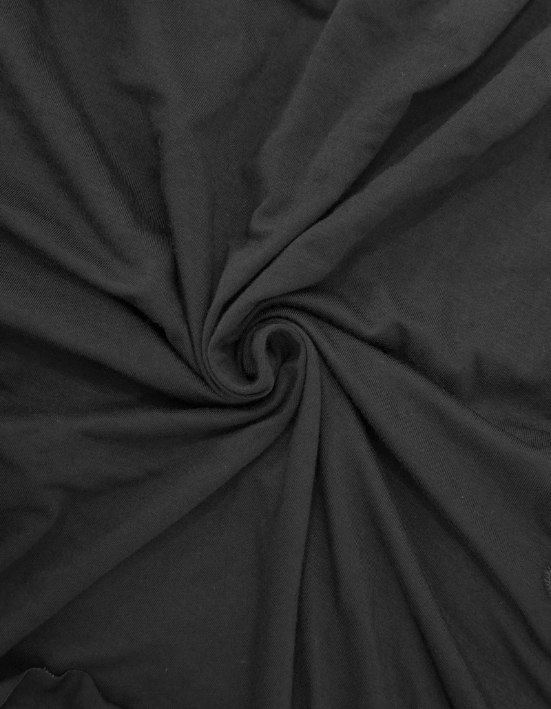 Close-up of soft black fabric showcasing its smooth texture, perfect for creating stylish gothic clothing.
