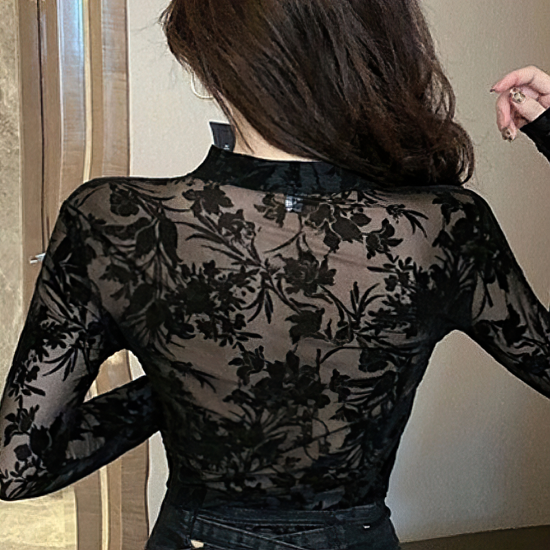 Back view of a sexy women's long-sleeved blouse featuring floral lace embroidery, perfect for casual chic outfits.
