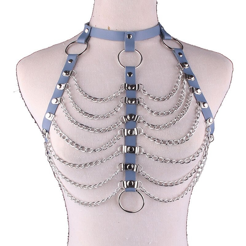 Women's sexy hollow out PU strap body harness with chains and rings in alternative fashion.