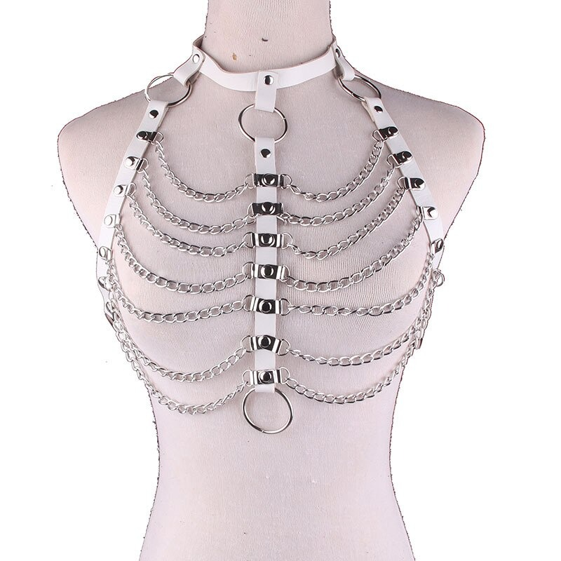 Women's sexy white PU strap body harness with chains and metal rings for alternative fashion and gothic looks.