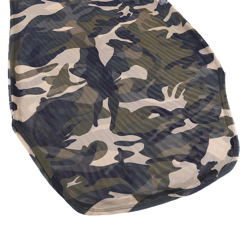 Close-up view of women's camouflage dress showcasing military-style pattern in shades of green and beige.
