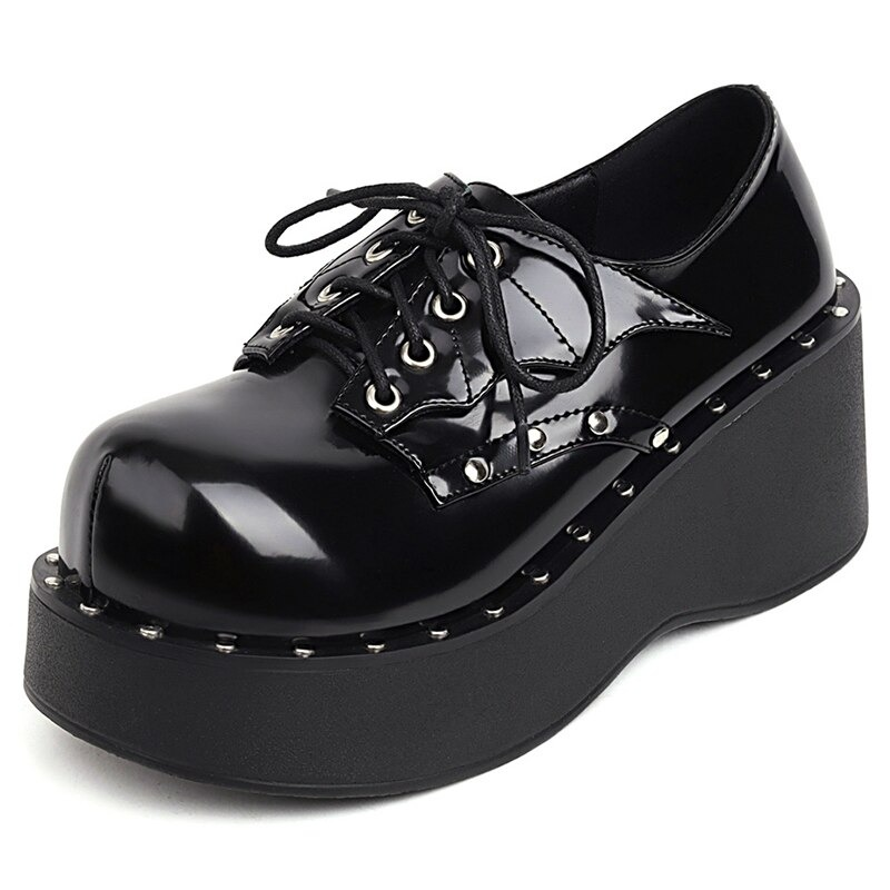 Black platform punk shoes with lacing, perfect for a trendy women’s wardrobe.