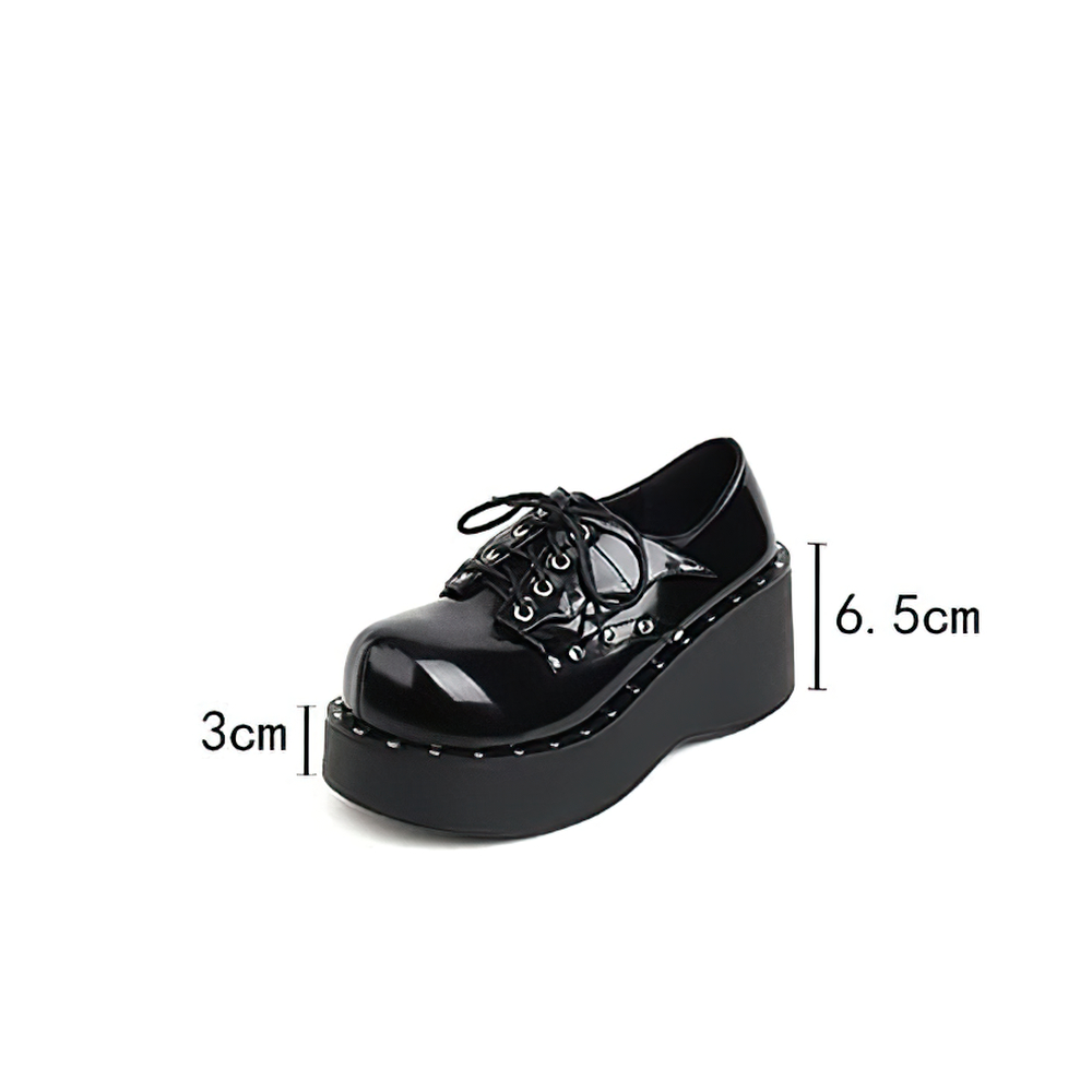 Trendy women's platform punk shoes in black latex leather with lacing and studded details, perfect for a punk wardrobe.