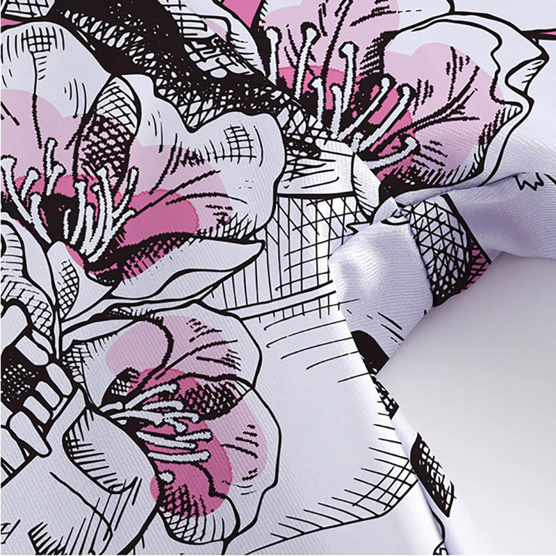 Close-up of Women's Skull Head Print Leggings featuring floral patterns and gothic style details.