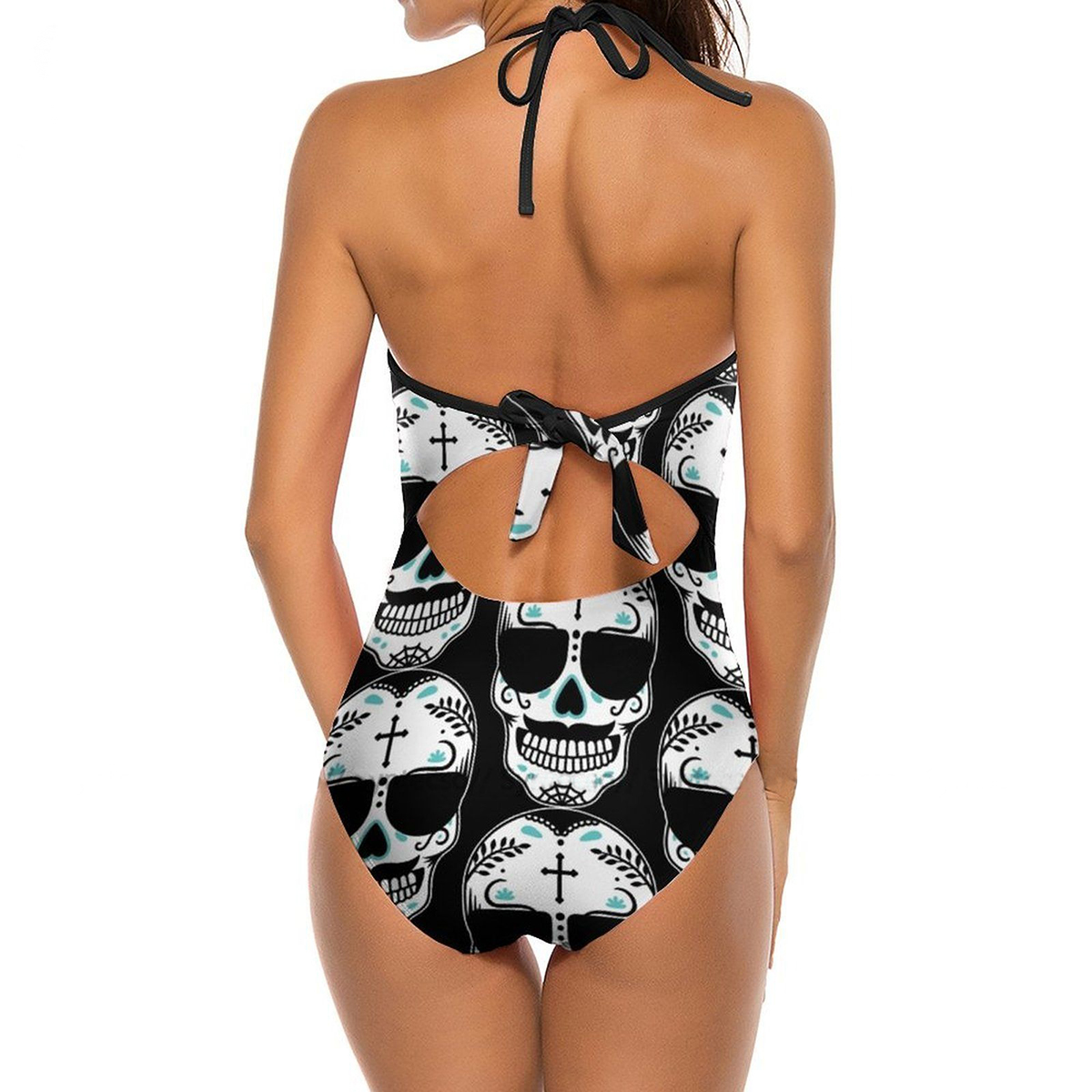 Back view of a women's sleeveless one-piece swimsuit featuring a bold 3D skull print, perfect for Halloween vibes.