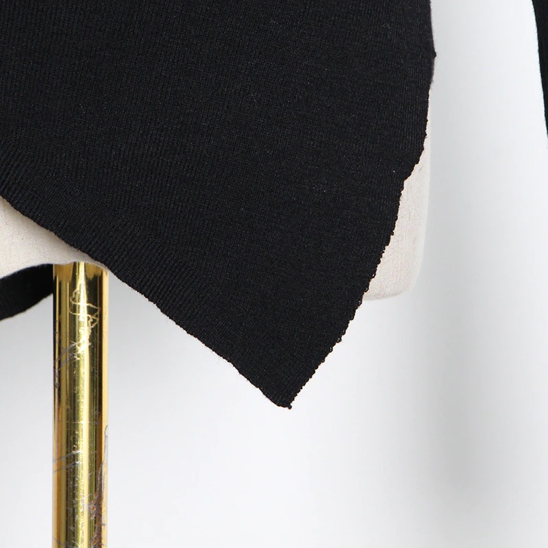 Close-up of black Women's Slim Top with one off-shoulder design, showcasing unique hollow out detailing for alternative fashion lovers.