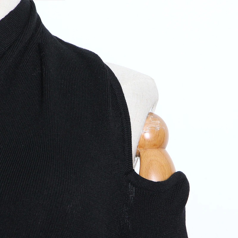 Close-up of Women's Black Slim Top with one off-shoulder design, perfect for alternative fashion.