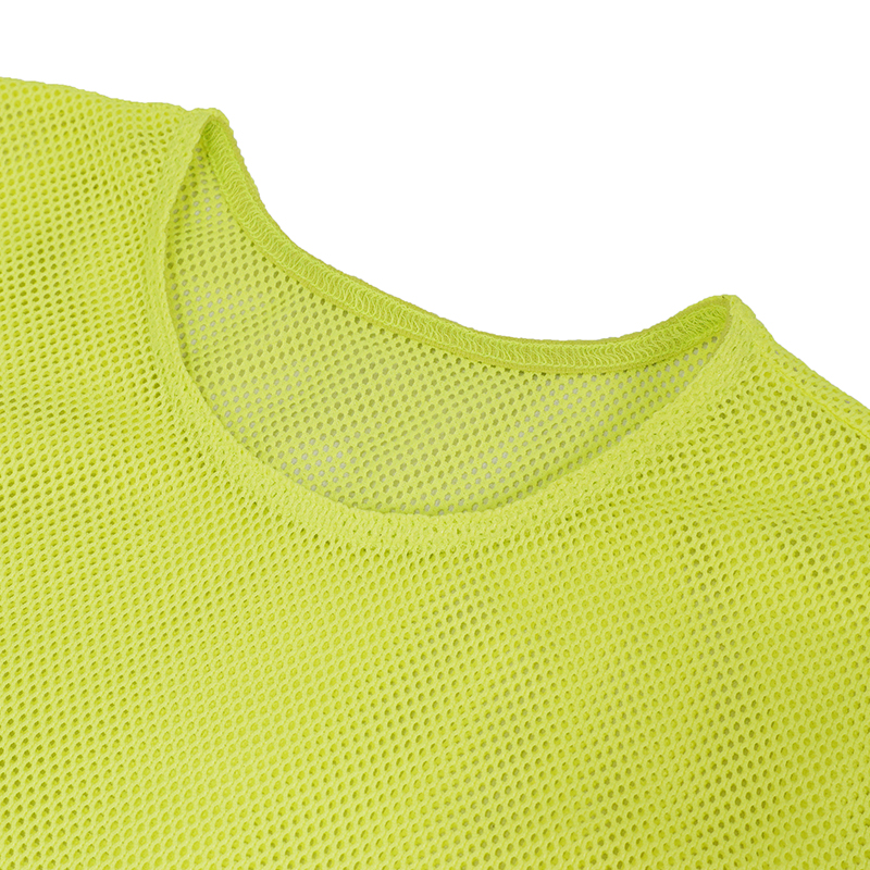 Close-up of a women's yellow mesh top showcasing a breathable, stretchy fabric perfect for alternative style fashion.