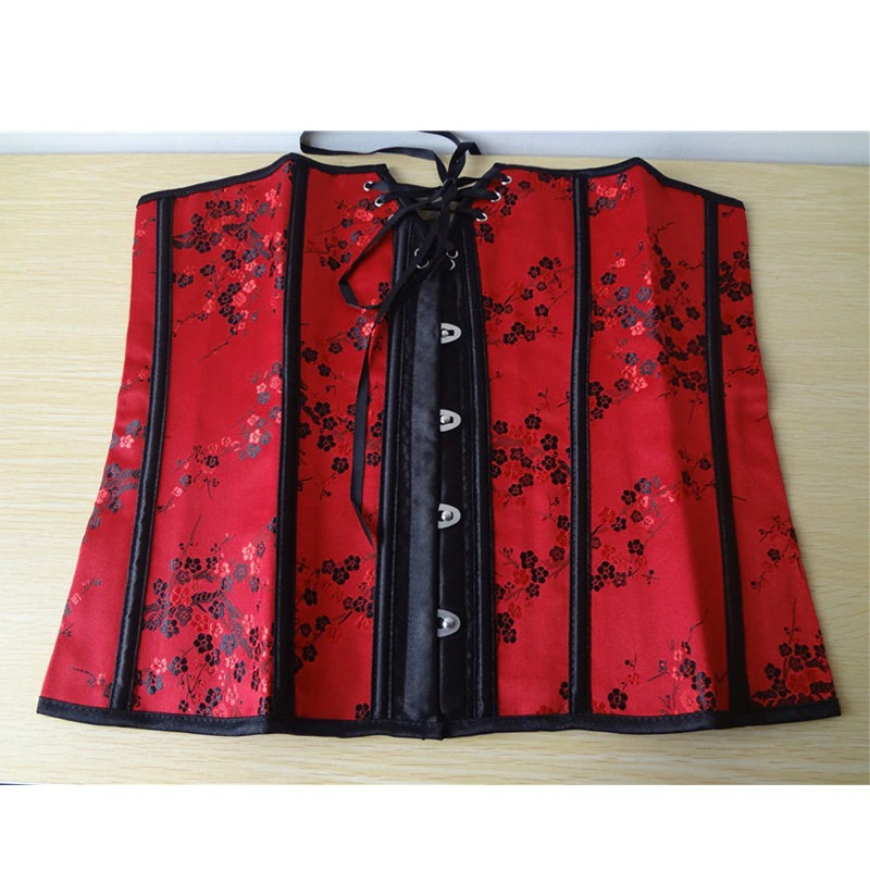 Elegant red gothic corset with floral print and lace-up front detail, perfect for a dramatic, stylish look.
