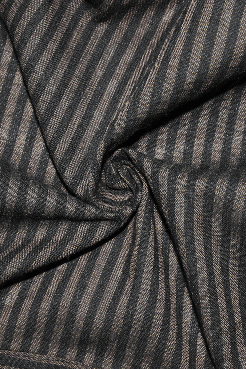 Close-up of black and brown striped fabric perfect for vintage and steampunk clothing designs.