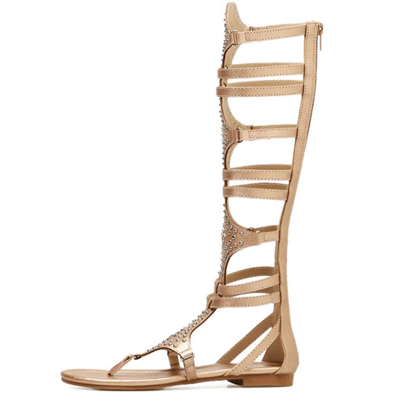 Stylish open toe gladiator sandals with decorative crystals, perfect for summer fashion. Low heel for comfort.