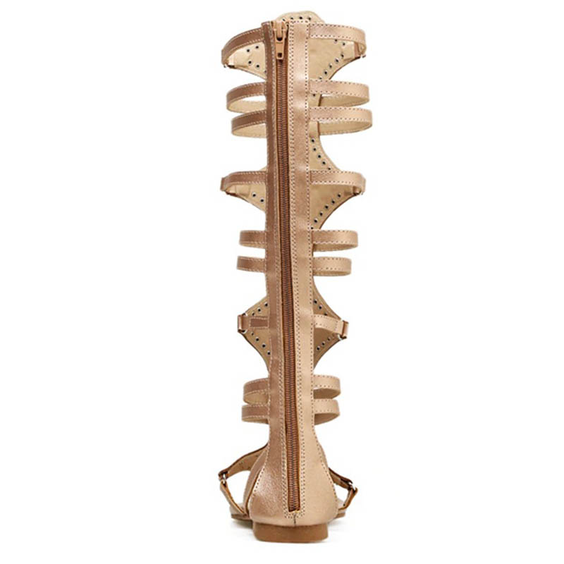 Stylish women's summer sandals with a low heel, back zipper, and trendy strap design in a soft beige color.