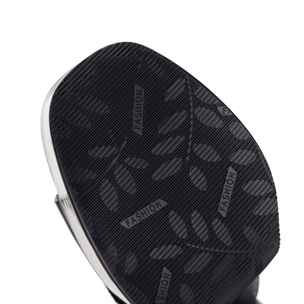 Sole of women's peep-toe high heels slippers featuring a stylish textured pattern and supportive grip.