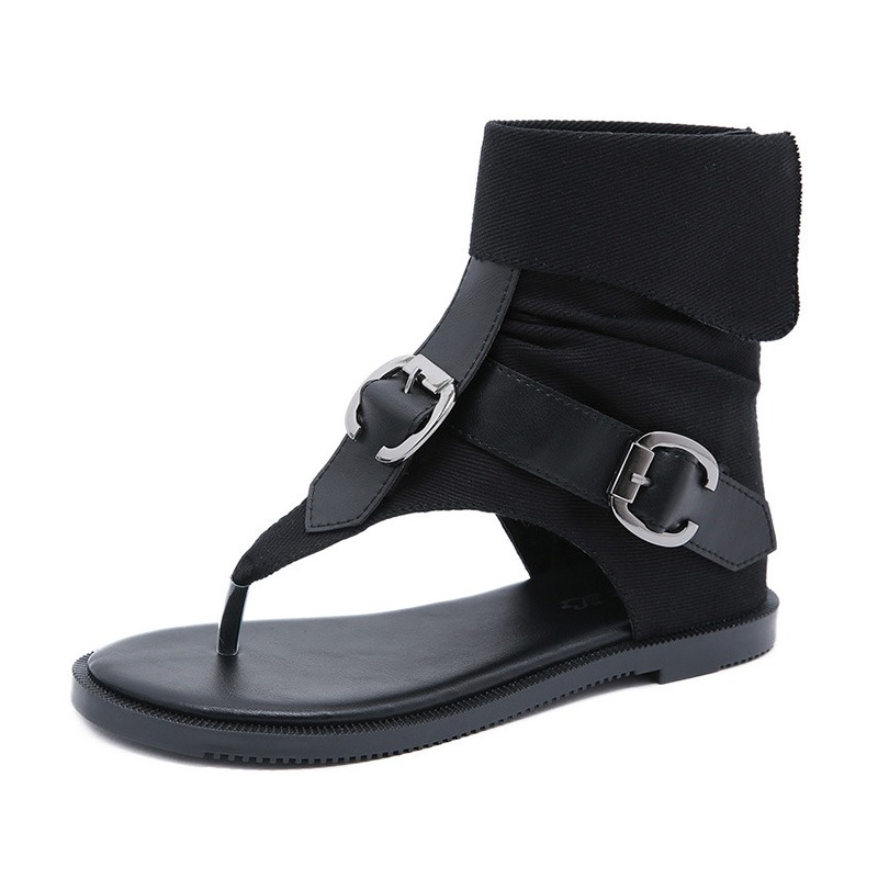 Rock chic women's black gladiator flip flops with ankle straps and buckles, perfect for summer style.