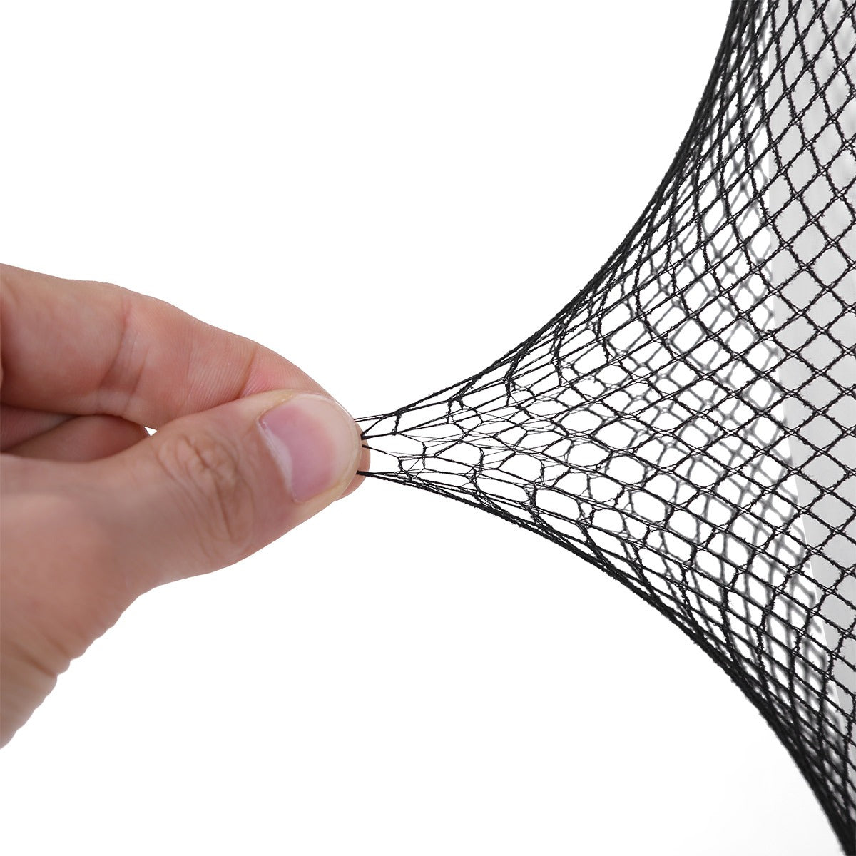 Close-up of a hand stretching a black mesh fabric, showcasing the unique texture of women's sexy sheer tights.