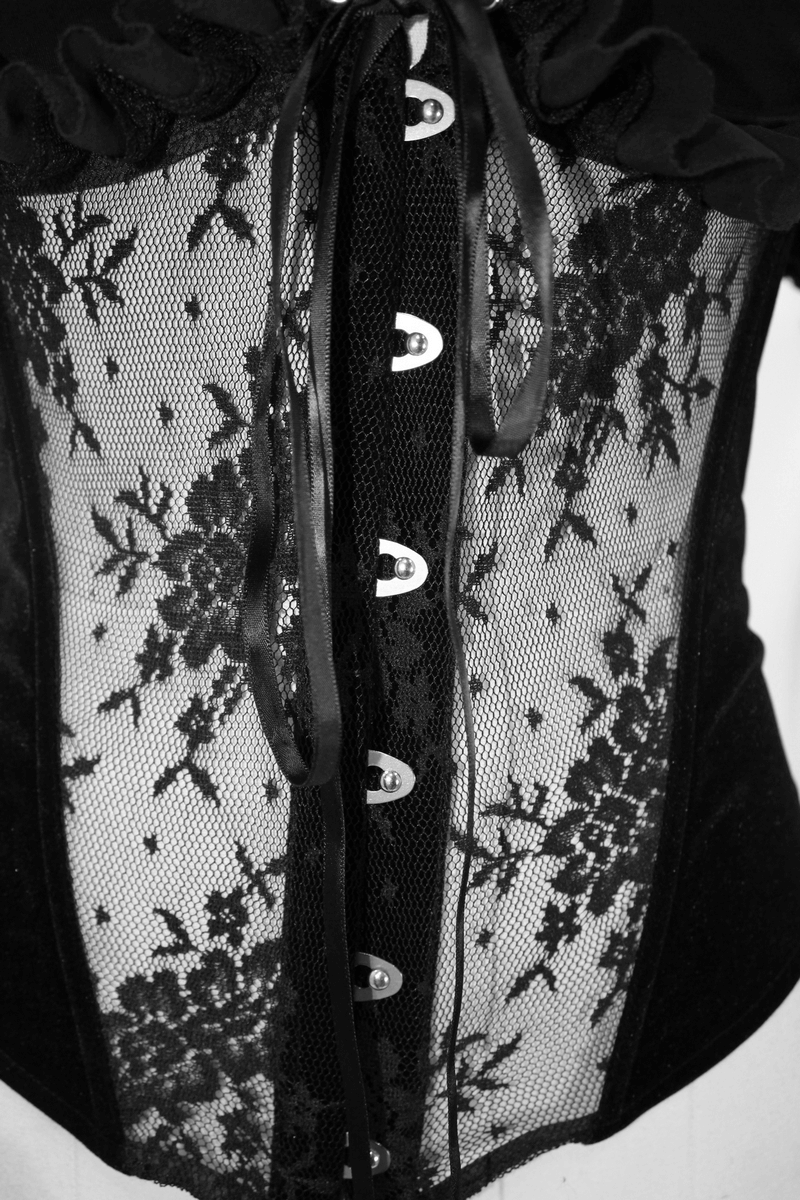 Elegant women's black transparent corset with lace and ribbon details, highlighting gothic style and intricate floral patterns.