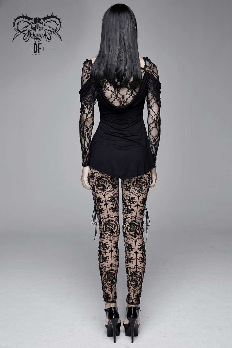 Back view of a woman in elegant transparent gothic leggings with lace and stylish black top.
