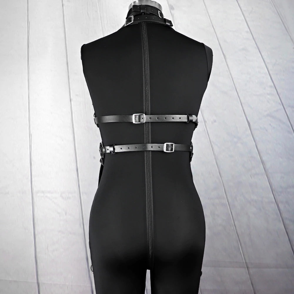 Back view of a women's bondage garter belt with straps, showcasing gothic fashion style and metal accents.
