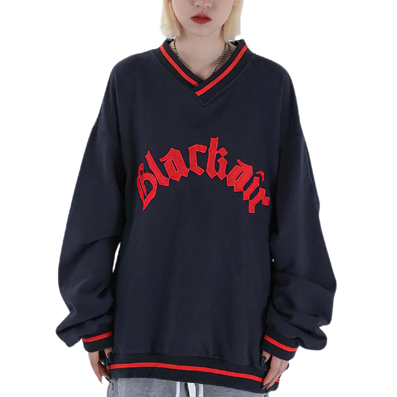 Trendy women's oversized V-neck sweatshirt in navy with 'Blackair' lettering, perfect for casual wear.