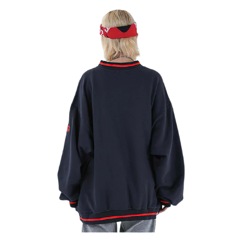 Back view of women's oversized v-neck sweatshirt, featuring a trendy casual look and comfortable fit.