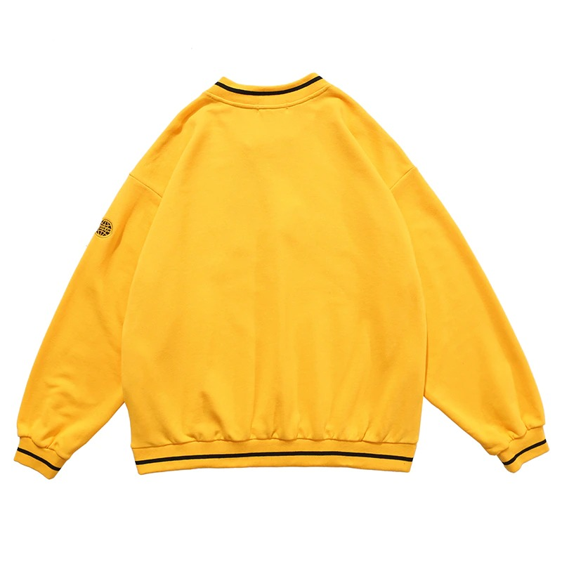 Back view of women's oversized yellow V-neck sweatshirt with striped collar and cuff for casual fashion.