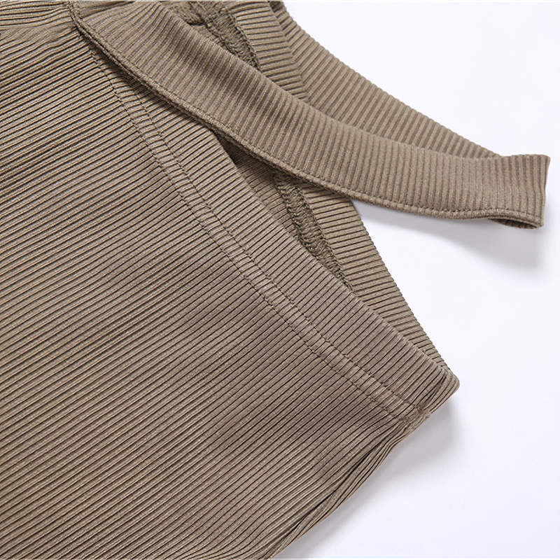 Close-up of textured fabric showing the waistband of women's vintage gothic high waist pants.