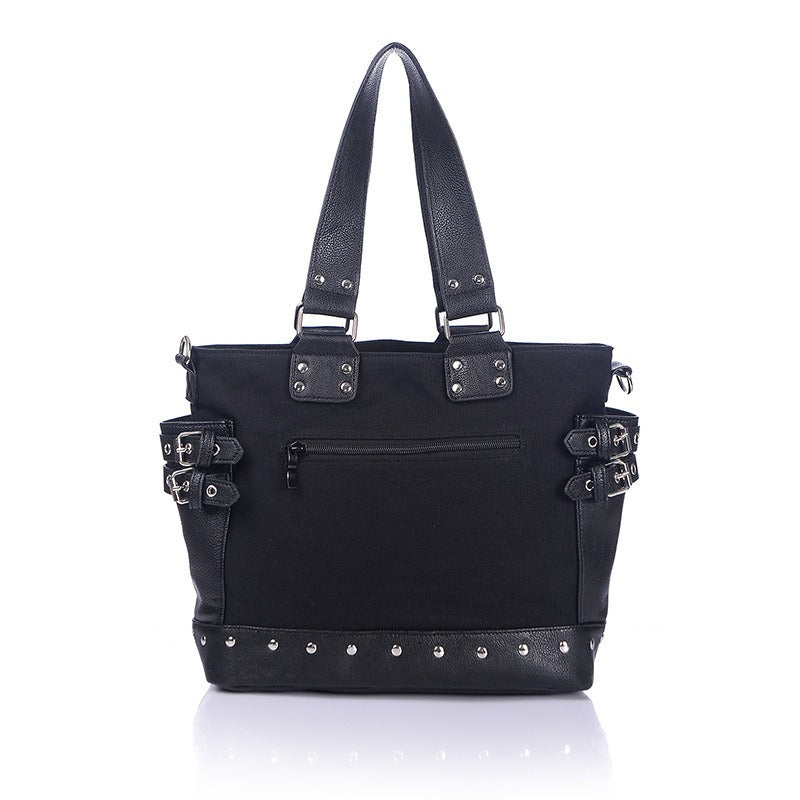Women's vintage rivet tote bag with zipper and stylish buckle details in black canvas.