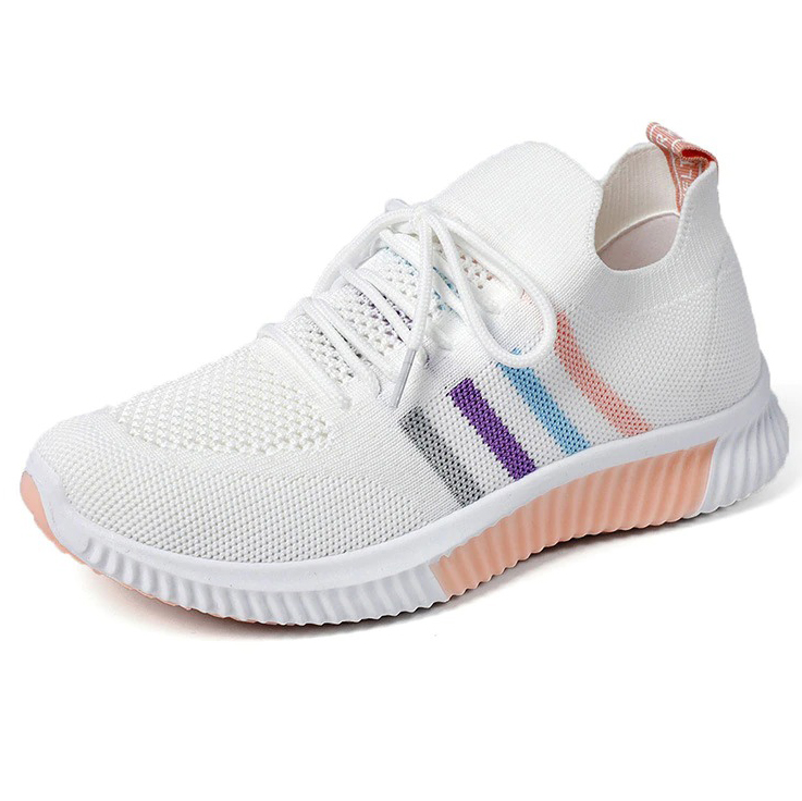 Women's white vulcanized sneakers with mesh breathable design, perfect for casual running and sports activities.