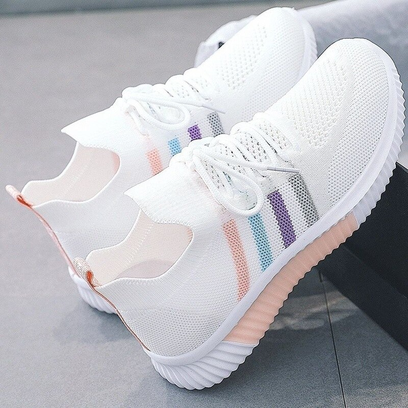 Women's breathable vulcanized sneakers in white with colorful stripes, perfect for running and casual wear.