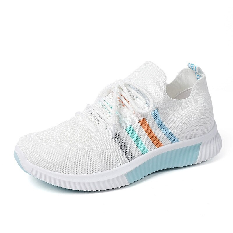 Women's white vulcanized sneakers with breathable mesh and colorful stripes, perfect for running and casual sports.