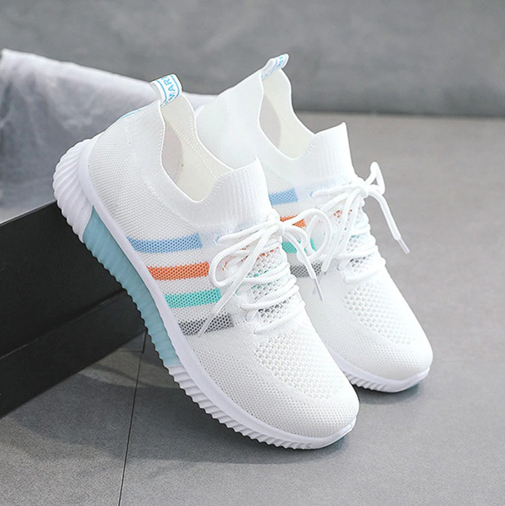 Women's breathable vulcanized sneakers in white with colorful stripes, perfect for running and casual sports.