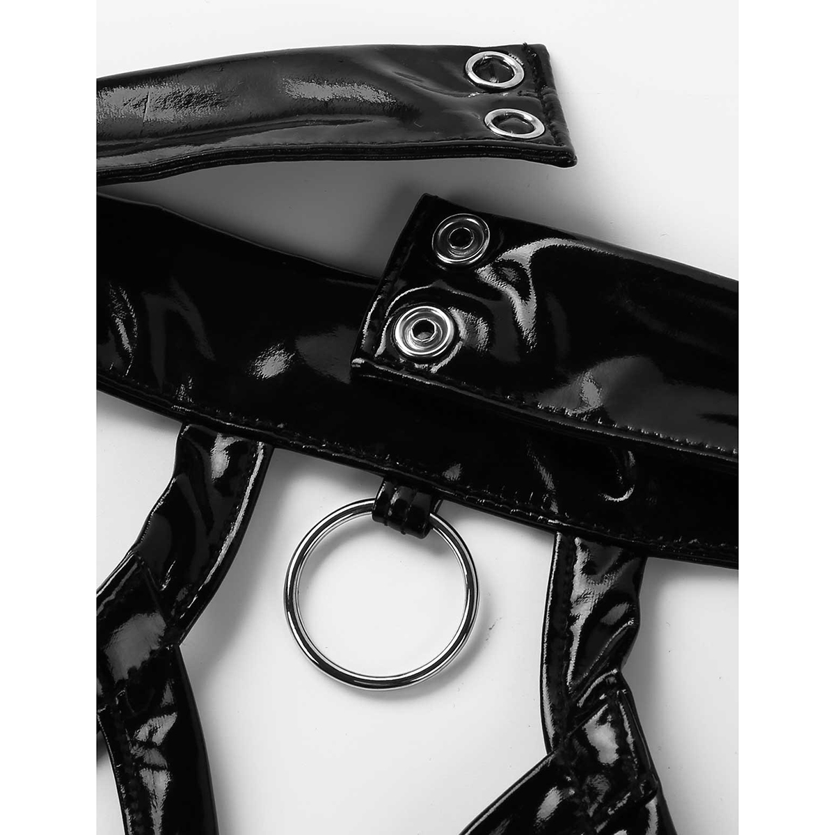 Close-up of black wet look straps featuring metal ring detail for seductive bodysuit design.