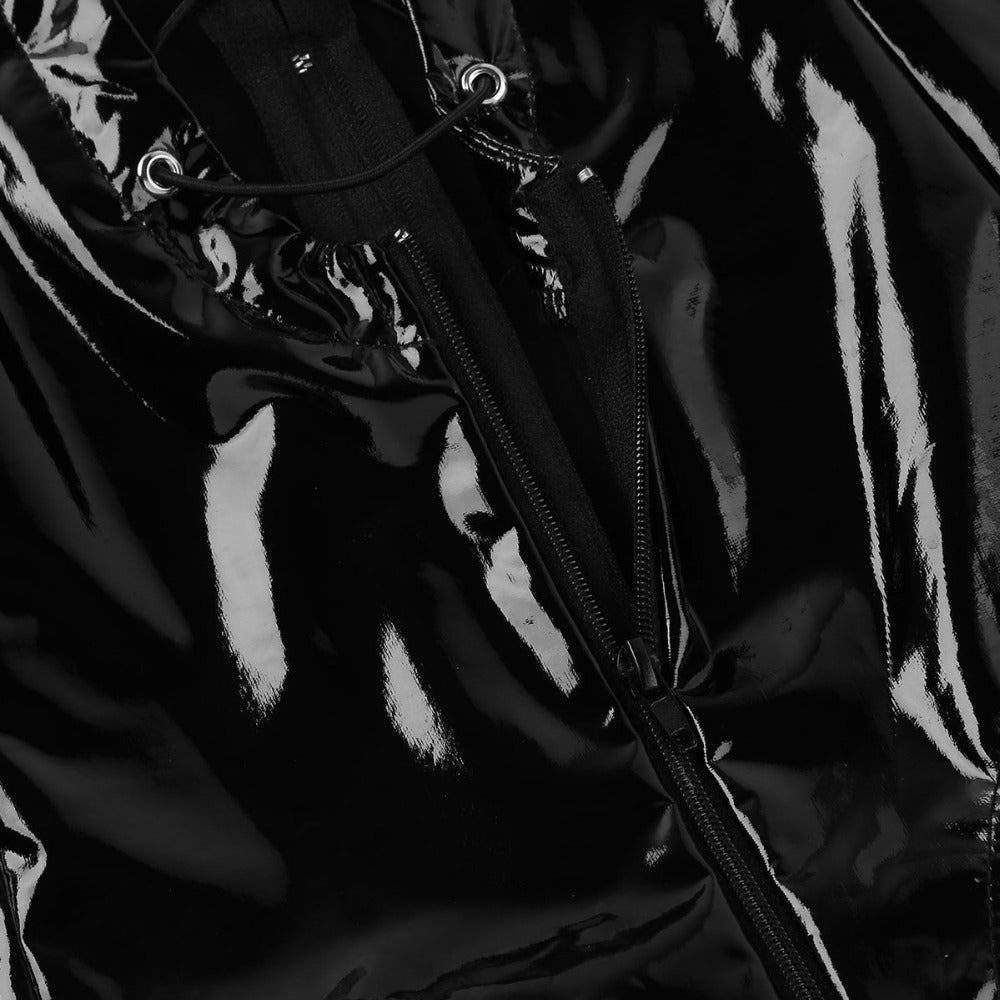 Close-up of black wet look bodysuit fabric with zipper detail and lace-up ties for a sexy evening outfit.