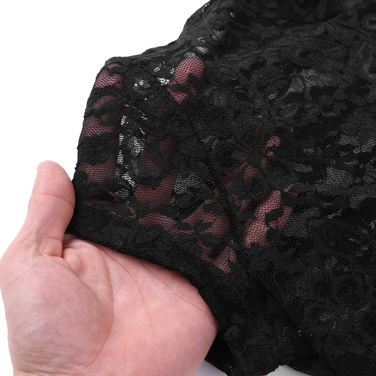 Close-up of soft black lace fabric for women's Gothic bodysuit, showcasing texture and quality.