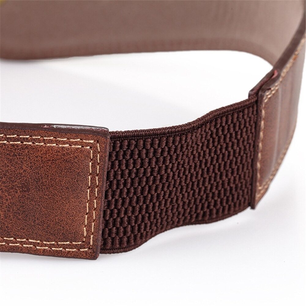 Wide leather and elastic corset belt with rivets, showcasing vintage brown style and trendy design.